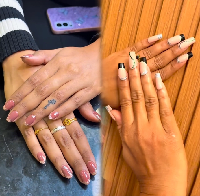 Long nail extension design showcasing polished texture, decorative nail art accents and precise shaping