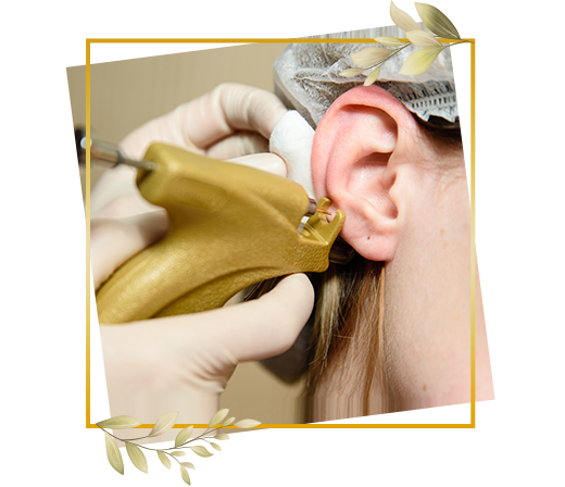 Hygienic ear piercing session at TrendMi Salon performed with advanced sterile equipment.