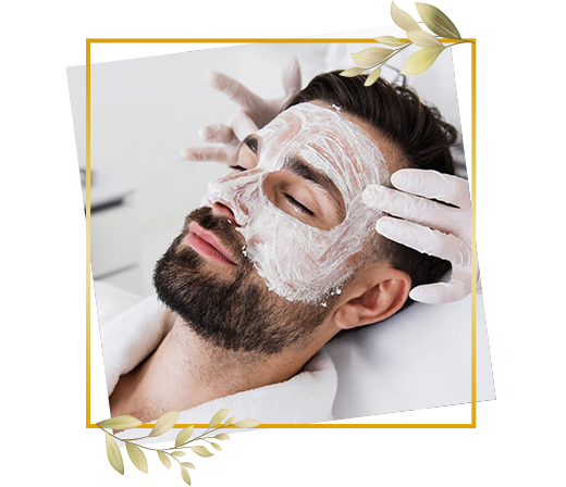 Man receiving deep face clean up session with cream applied for skin cleansing and grooming.