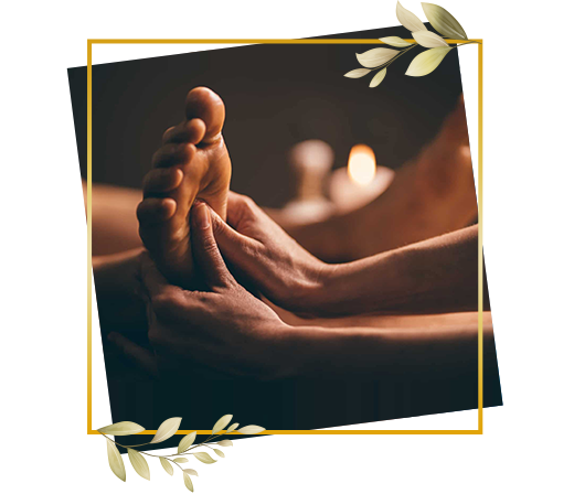 Men's foot reflexology service performed during spa session to stimulate pressure points and promote relaxation